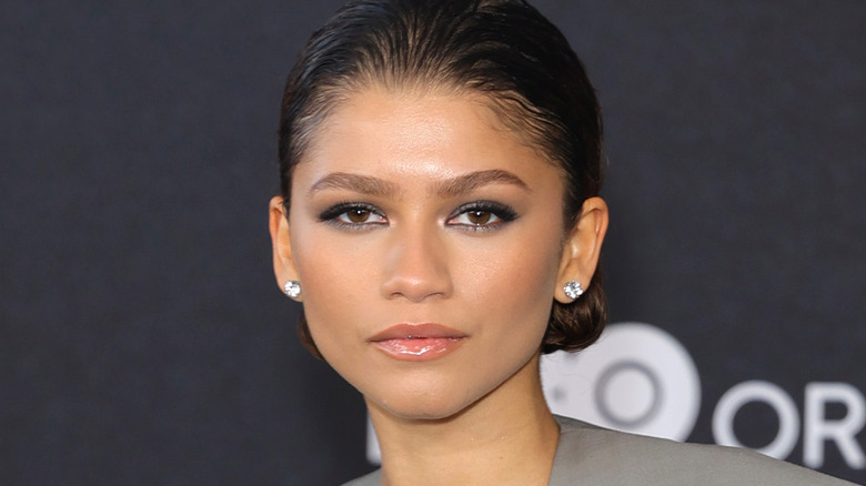 Zendaya smirking