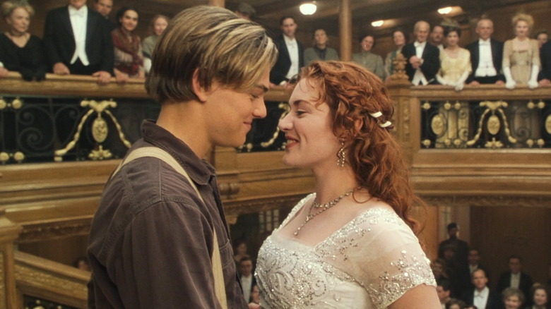 Jack and Rose smiling at each other in Titanic 