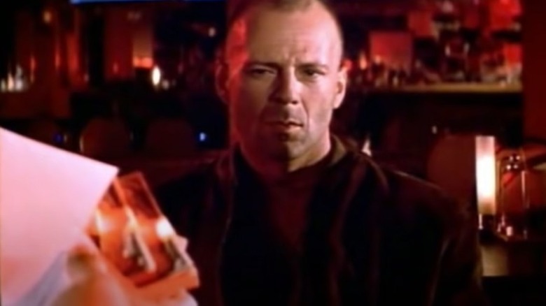 Bruce Willis taking money