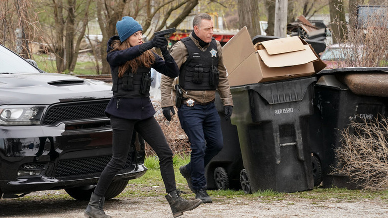 Kim Burgess and Hank Voight investigating