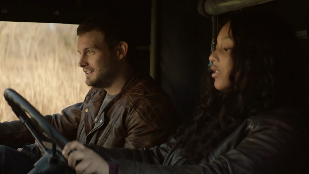 Felix teaching Iris how to drive a stick shift on The Walking Dead: World Beyond