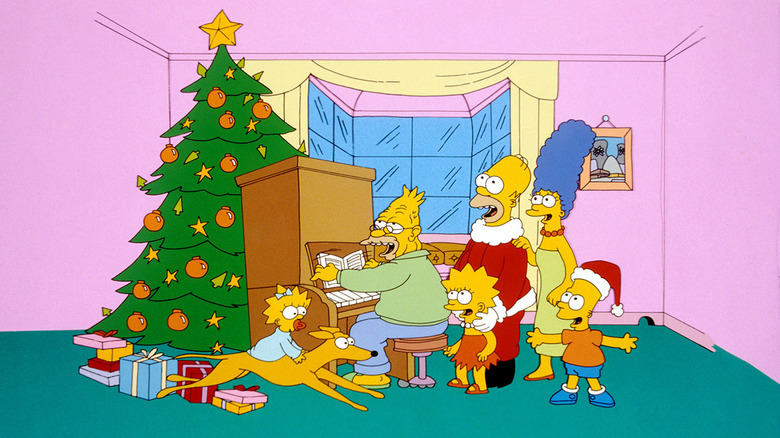 The Simpsons family singing at Christmas