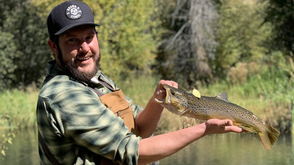 Gator from Yellowstone holding fish