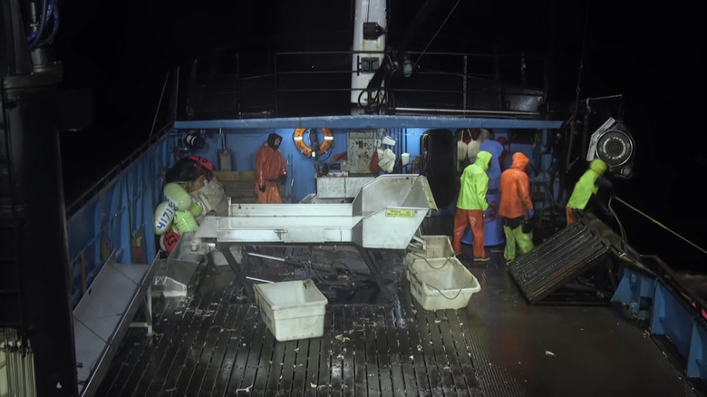 Deadliest Catch crew hauling crabs