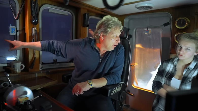 Captain Sig Hansen explains to his daughter why conditions are too poor for her to be on the boat.