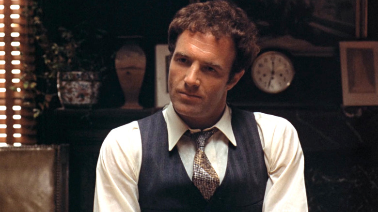 Sonny Corleone wearing a suit