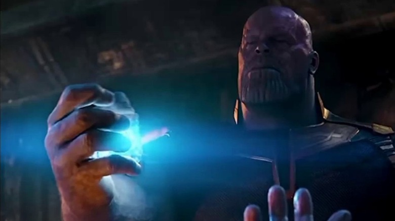 Thanos holds the Tesseract