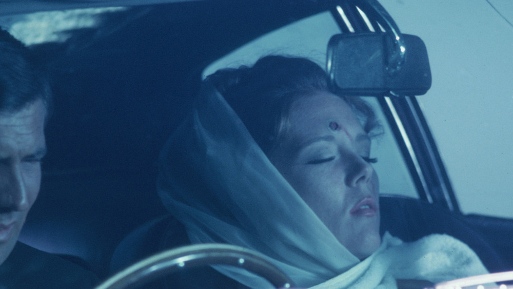 Diana Rigg as Countess Tracy di Vicenzo, murdered in the passenger seat, in On Her Majesty's Secret Service