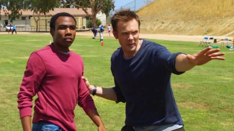 Community Troy and Jeff on football field