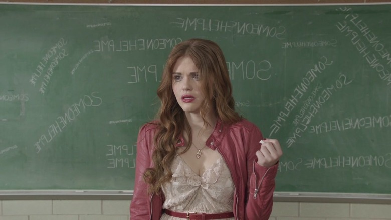 Lydia at a chalkboard