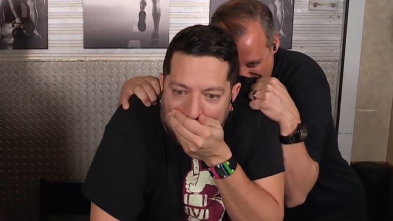 Sal holding hand over mouth