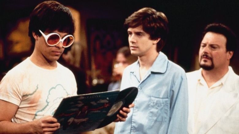 Eric Forman and an angel looking at Fez