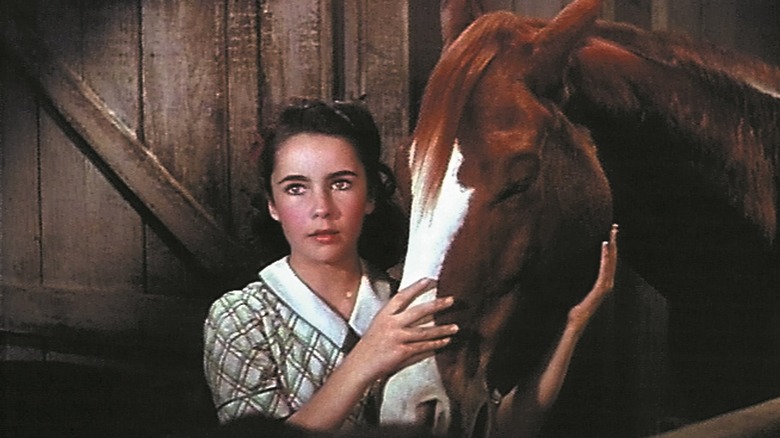 Elizabeth Taylor with a horse in National Velvet