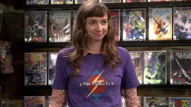 Denise smiles in the comic book store