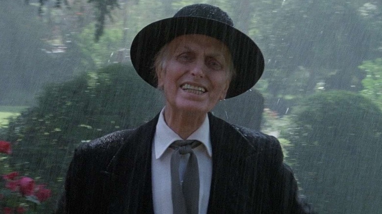 Reverend Kane in rain