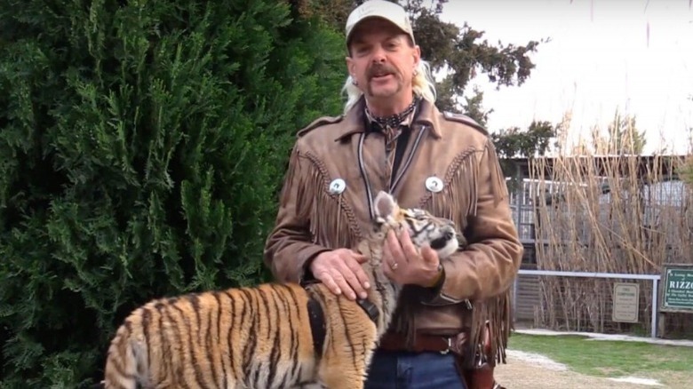 Joe Exotic with a tiger