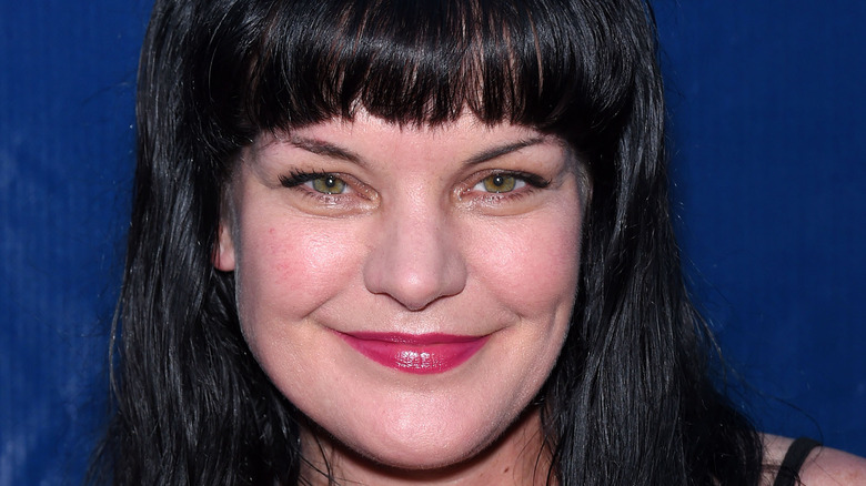 Pauley Perrette smiles