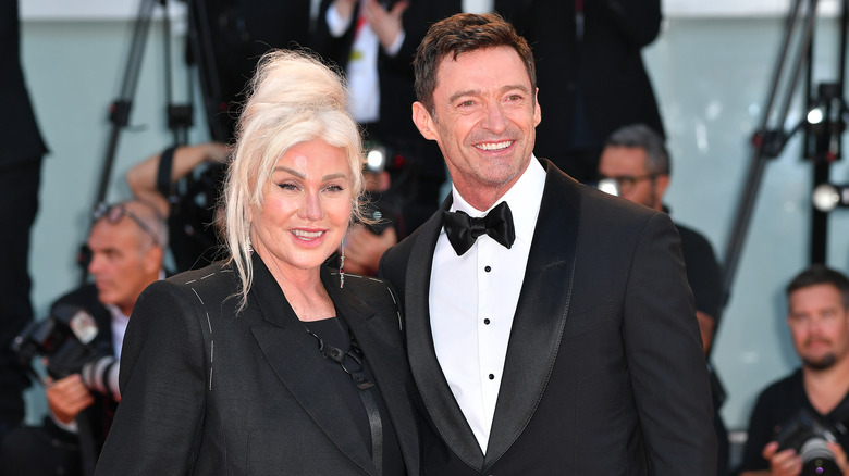 Hugh Jackman smiling with wife