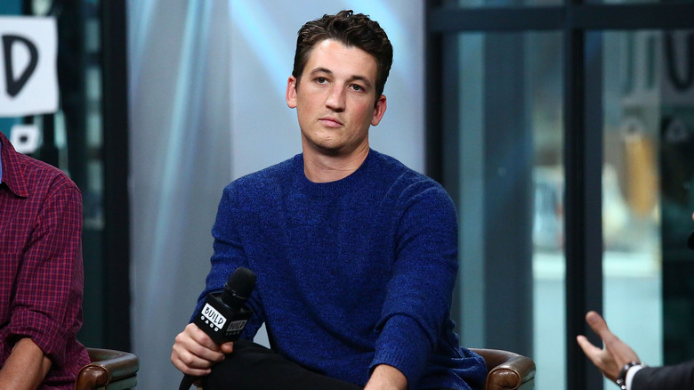 Miles Teller sitting for interview