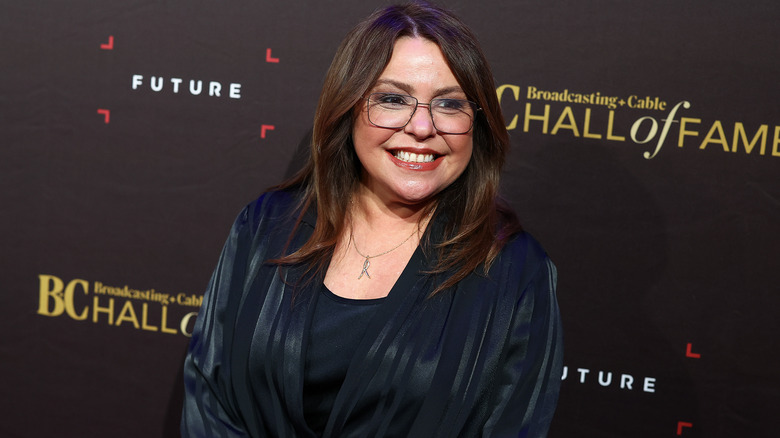 Rachael Ray smiling in a black outfit at Broadcasting + Cable Hall of Fame Gala in 2023