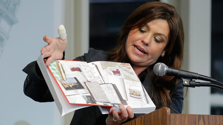 Rachael Ray shows the audience her book "My Year in Meals"' at Barnes & Noble Union Square in New York City in  2012