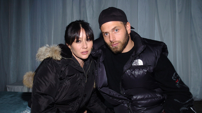 Shannen Doherty hugging Rick Salomon