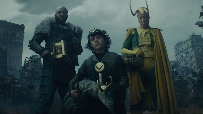 Kid Loki flanked by other Lokis in Loki