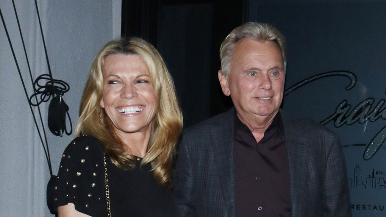 Vanna White with Pat Sajak smiling