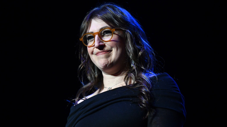 Mayim Bialik smiling onstage