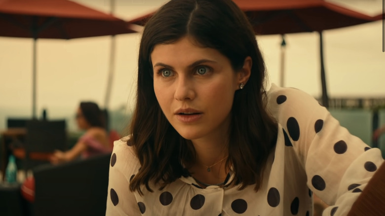 Alexandra Daddario talking at table