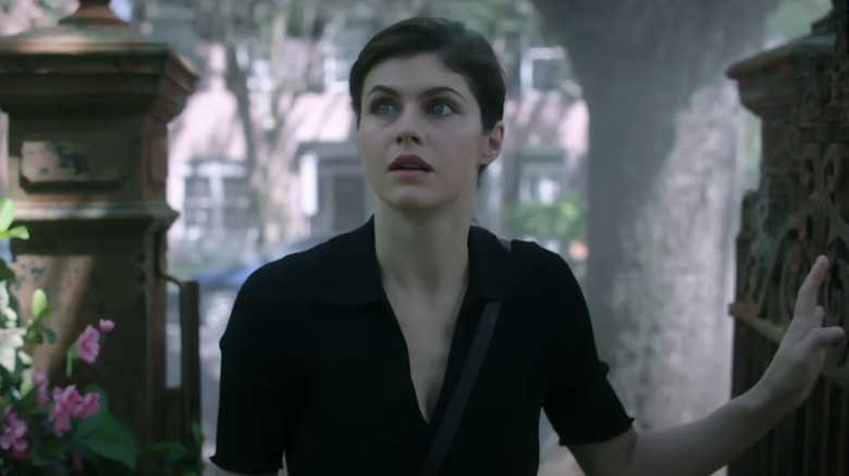 Alexandra Daddario glances into distance