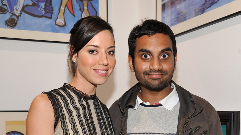 Aubrey Plaza and Aziz Ansari smiling