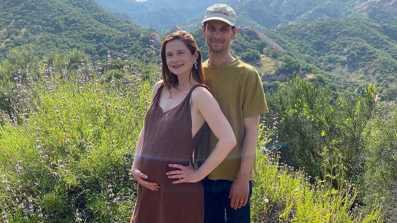 Bonnie Wright and Andrew Lococo stand together