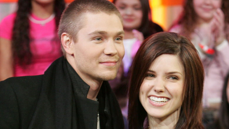 Chad Michael Murray smiling with Sophia Bush 