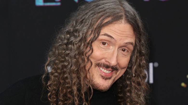 Weird Al Yankovic smiling at camera