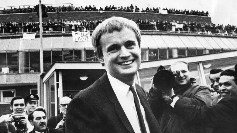 David McCallum smiling at London airport 