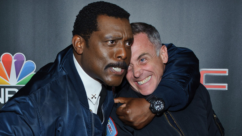 Eamonn Walker, David Eigenberg hugging