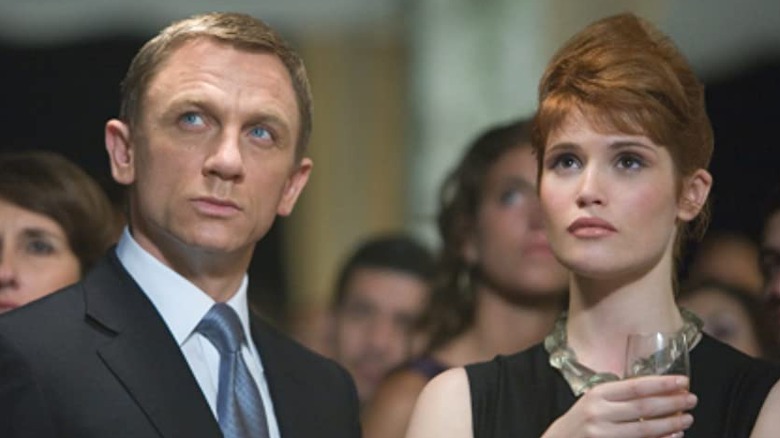 Daniel Craig and Gemma Arterton looking up in Quantum of Solace