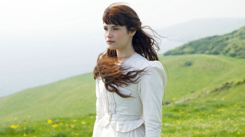 Gemma Arterton standing in a field in Tess of the D'Urbervilles