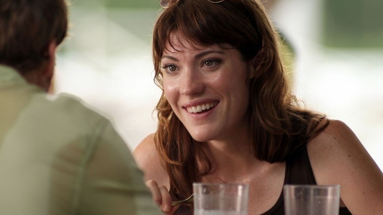 Debra Morgan laughing over drinks