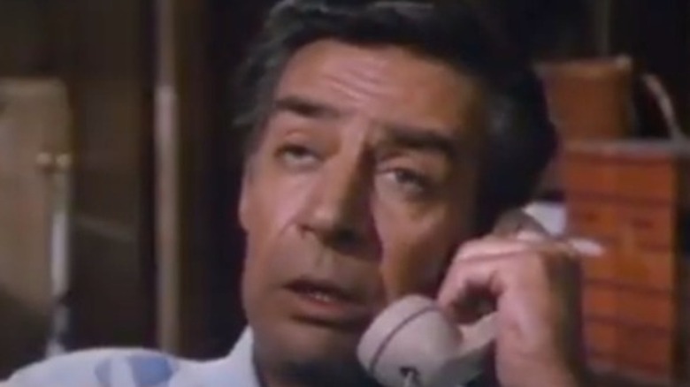 Jerry Orbach talking on the phone