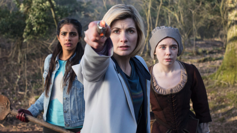 the thirteenth Doctor with two women