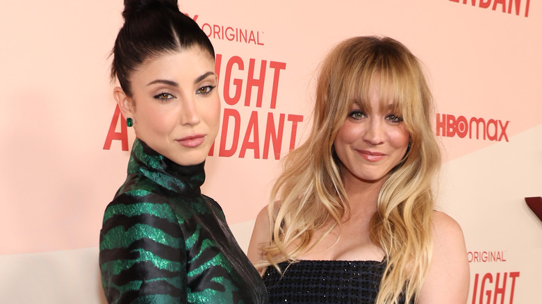 Kaley posing with her sister Briana on a red carpet for the Flight Attendant