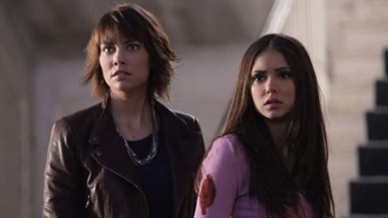 Rose and Elena looking fearful