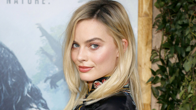 Margot Robbie raises eyebrow