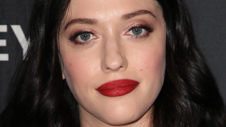 Kat Dennings poses