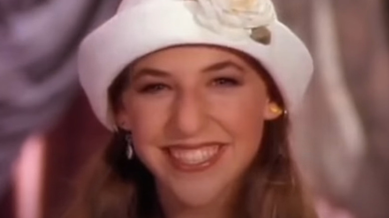 Blossom smiling in white hat