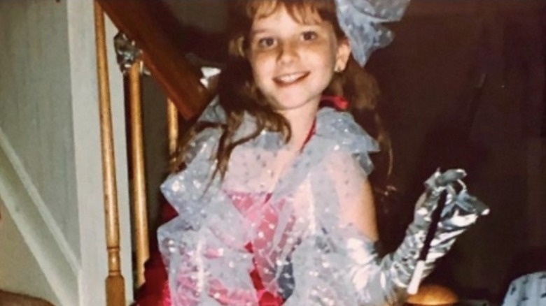 Young Melissa Rauch dressed up