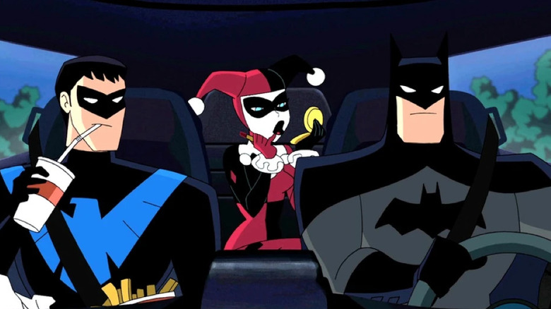 Batman, Nightwing, and Harley Quinn in a car