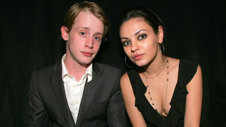 Culkin and Kunis pose for photos together